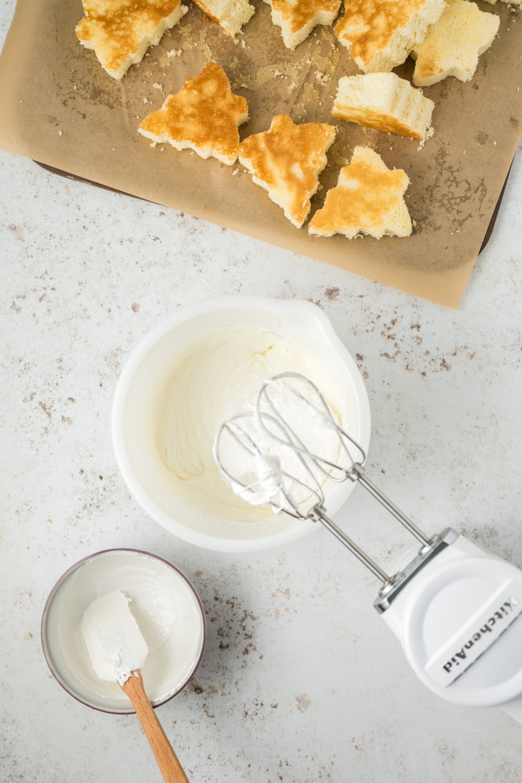 miing up frosting for the cakes