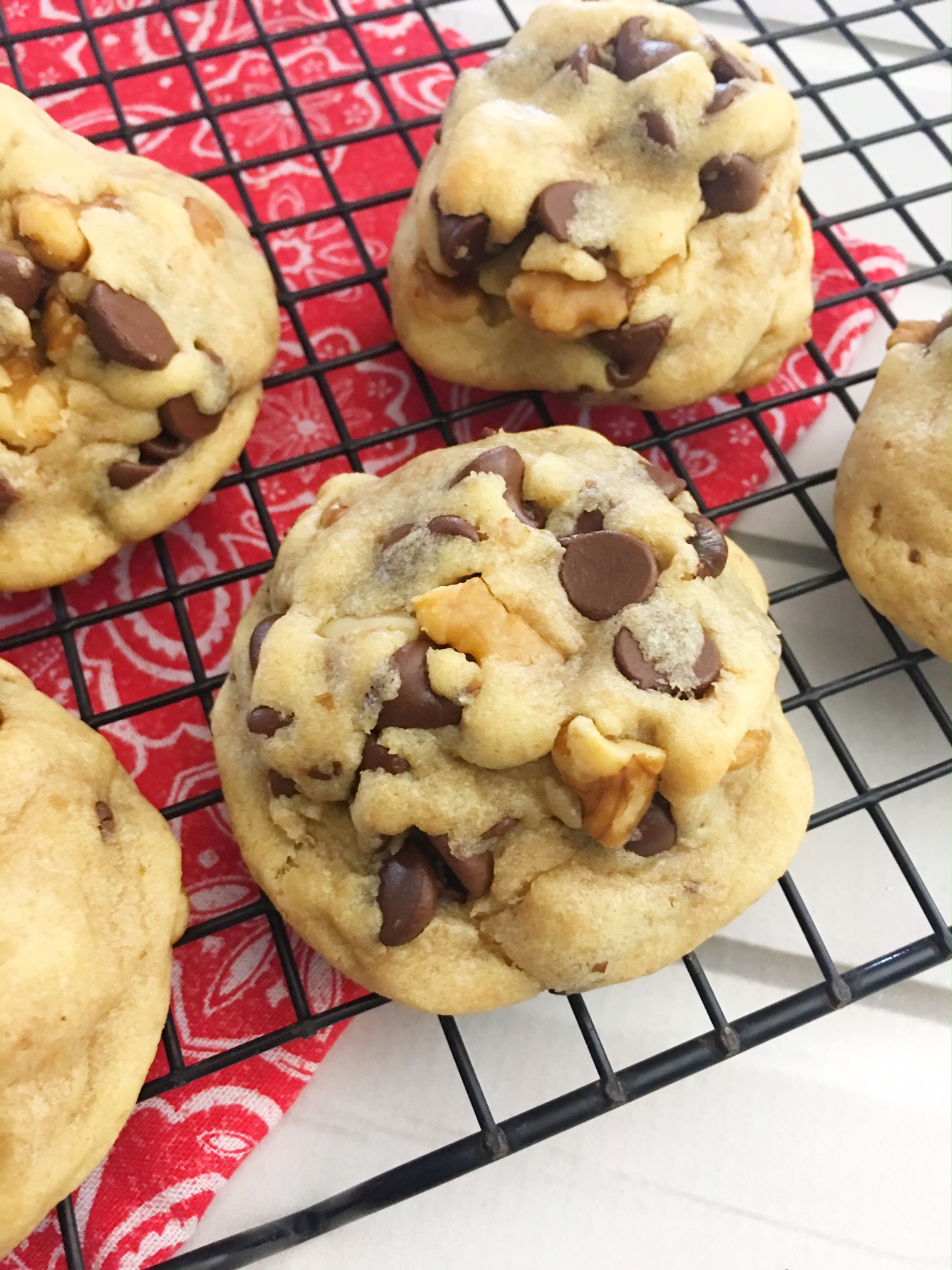 chocolate chip cookies on a baking tray on a table