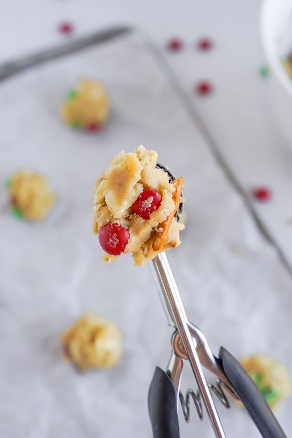 cookie scoop with cookie dough on it