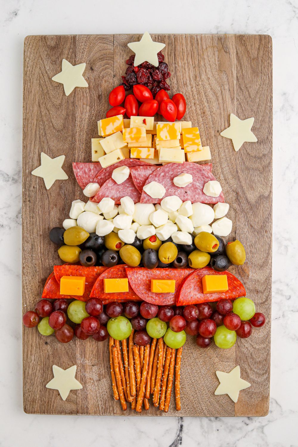 showing how to assemble a charcuterie board