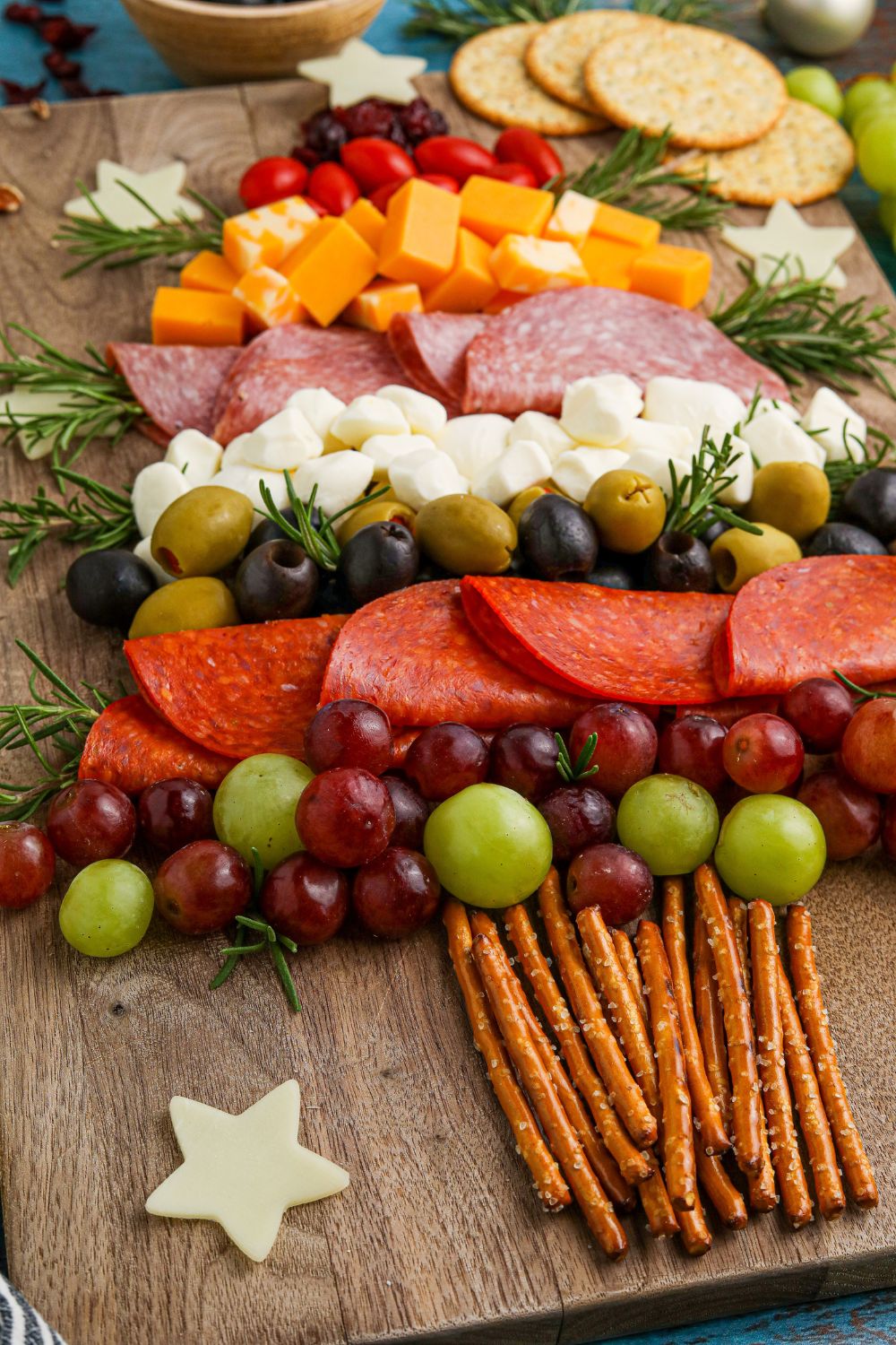 side view of a piece of the charcuterie board on table