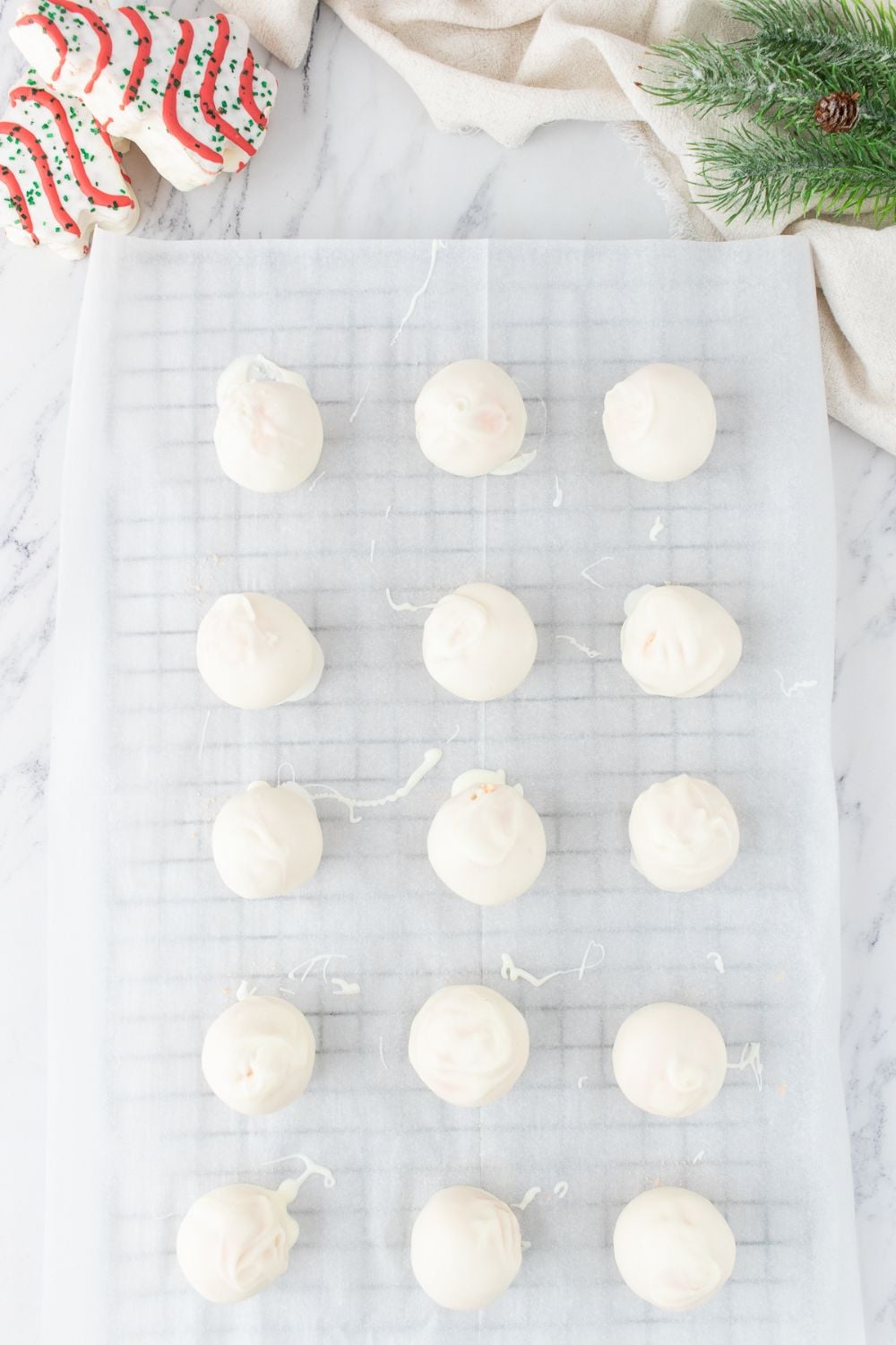 white chocolate truffles on cooling rack