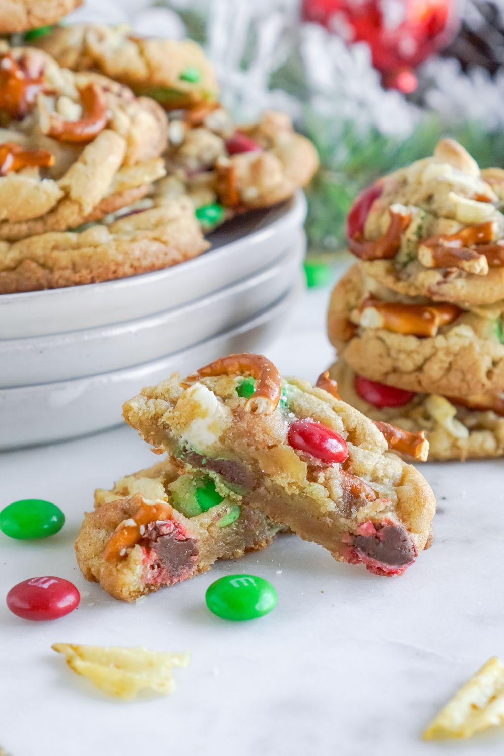 bite taken out of cookies on table and stacked on top of each other on table