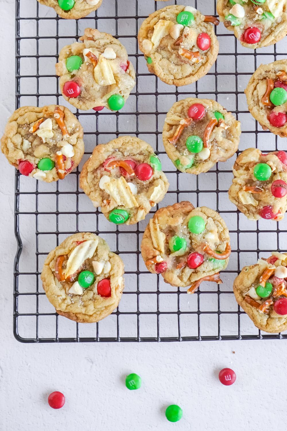 cooked Christmas cookies on a metal cooling rack