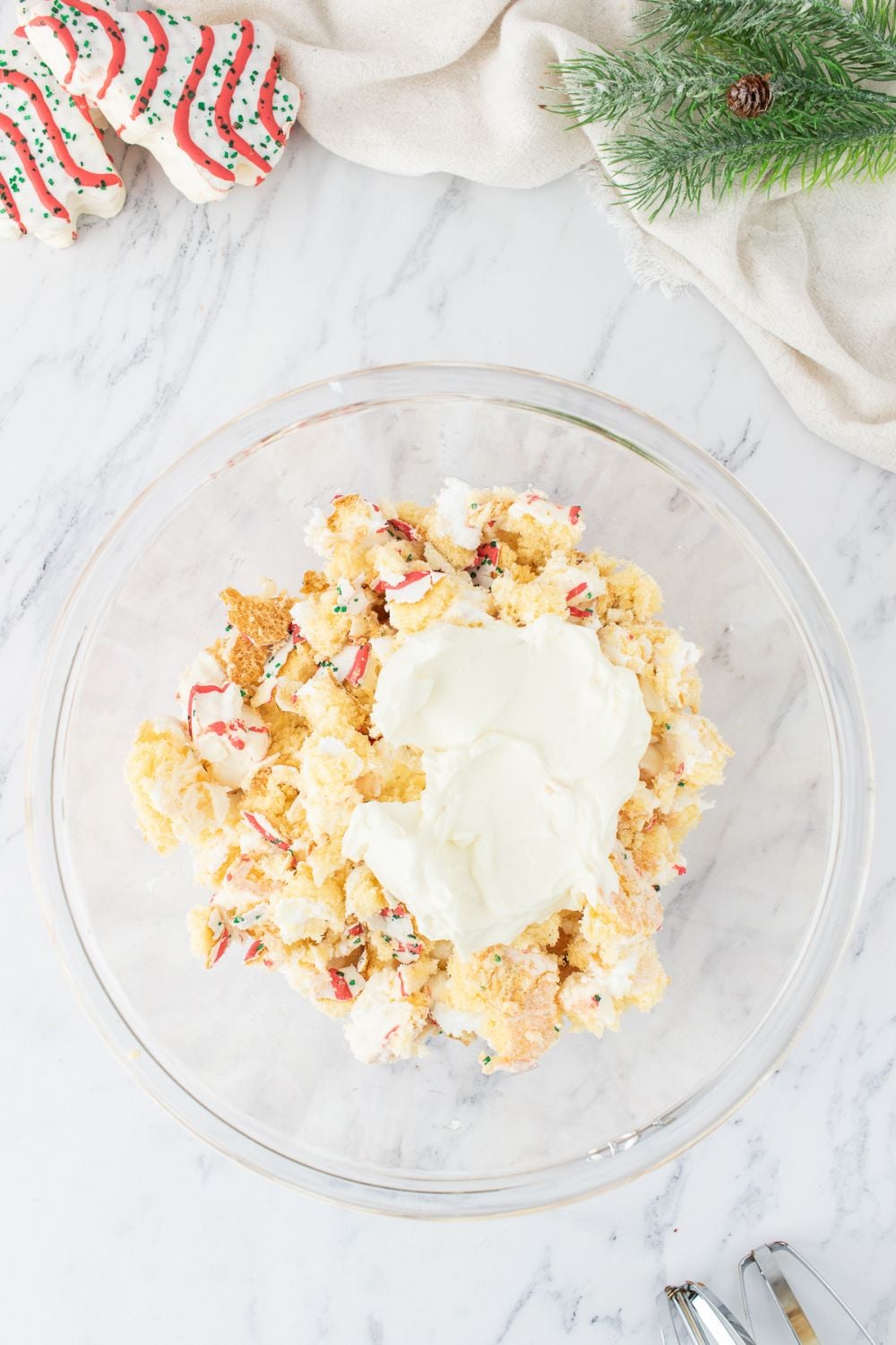 cream cheese and cakes in a bowl for cake truffles