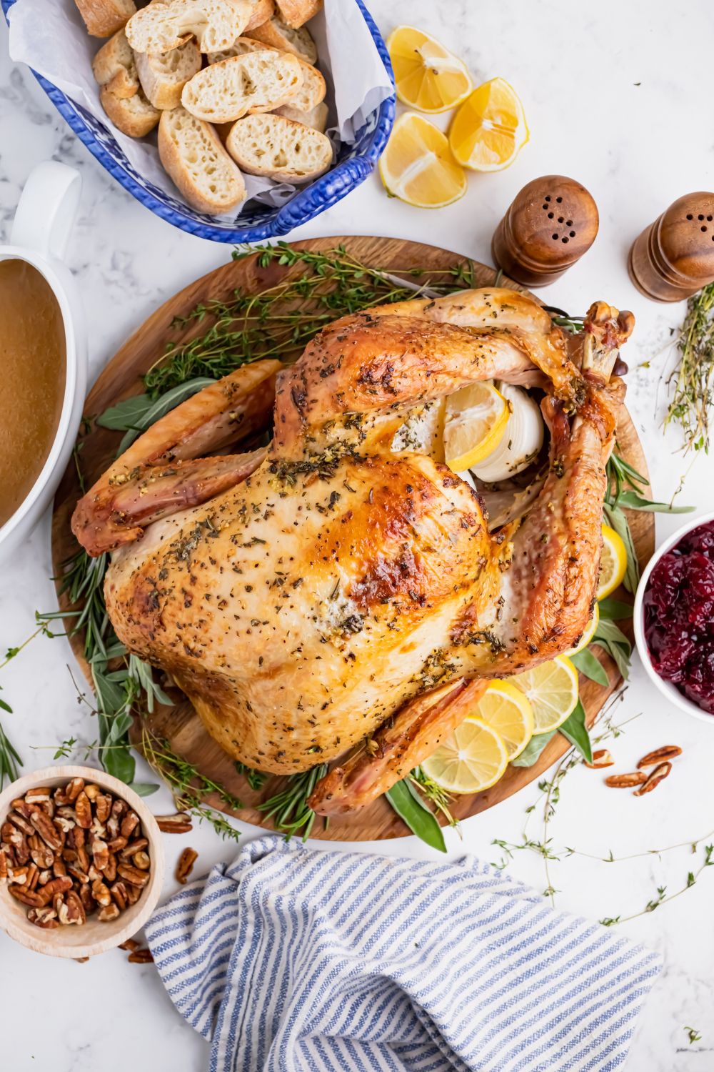 turkey on platter with items placed around table