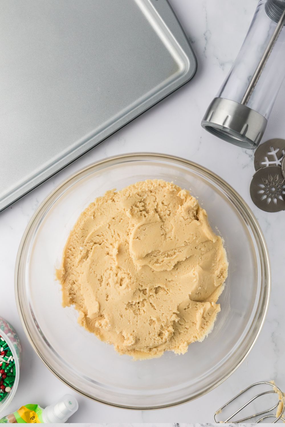 cookie dough in a glass bowl on table