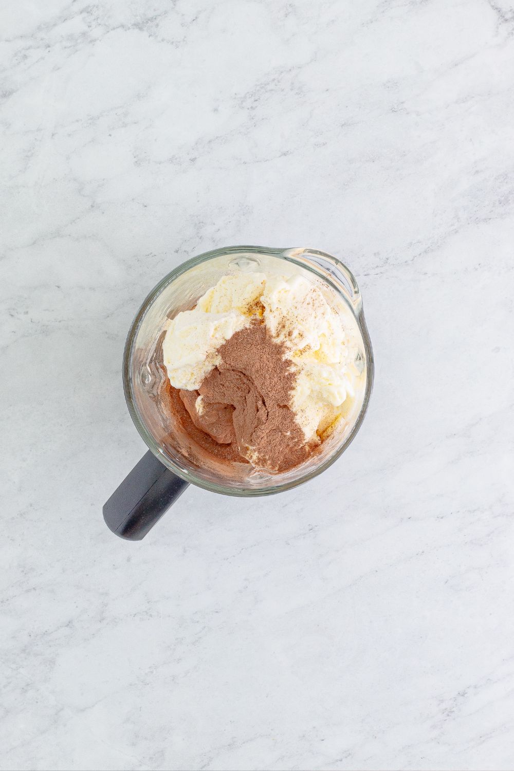 cocoa mix and ice cream in a blender