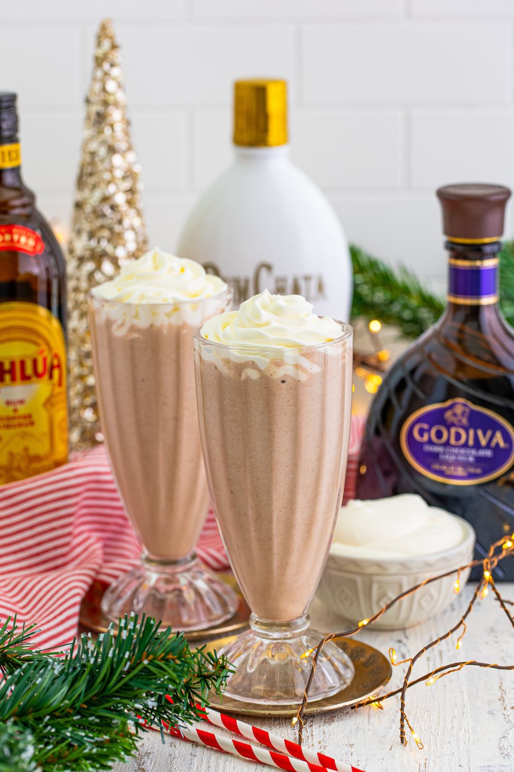 drunk rudolph milkshake in glasses with whipped cream on top