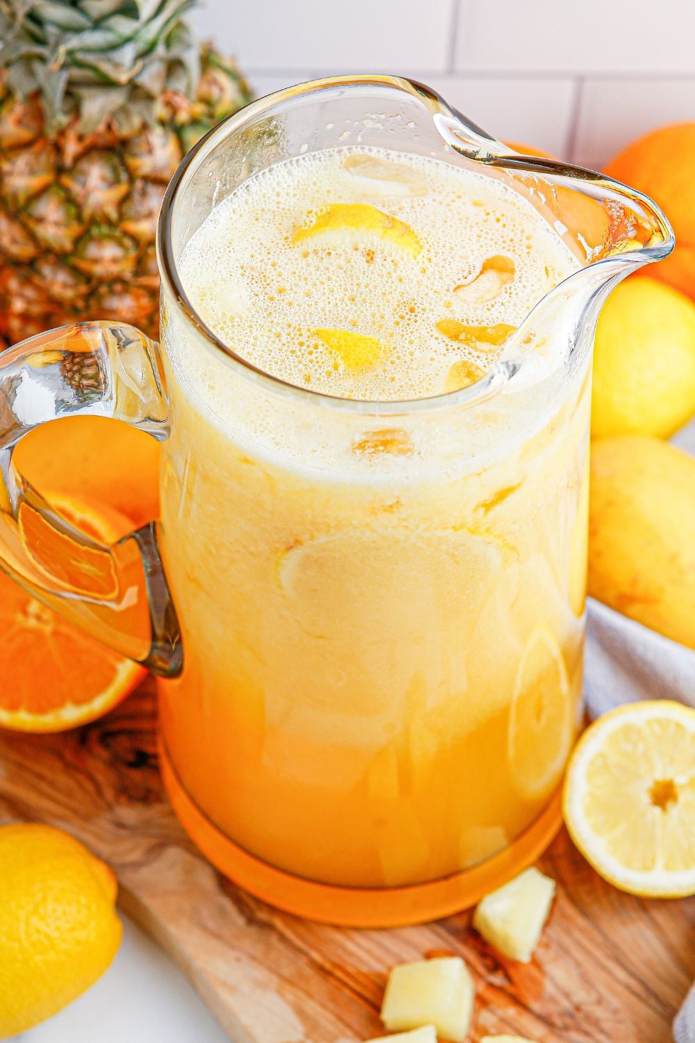 tropical fruit punch in a pitcher on table 