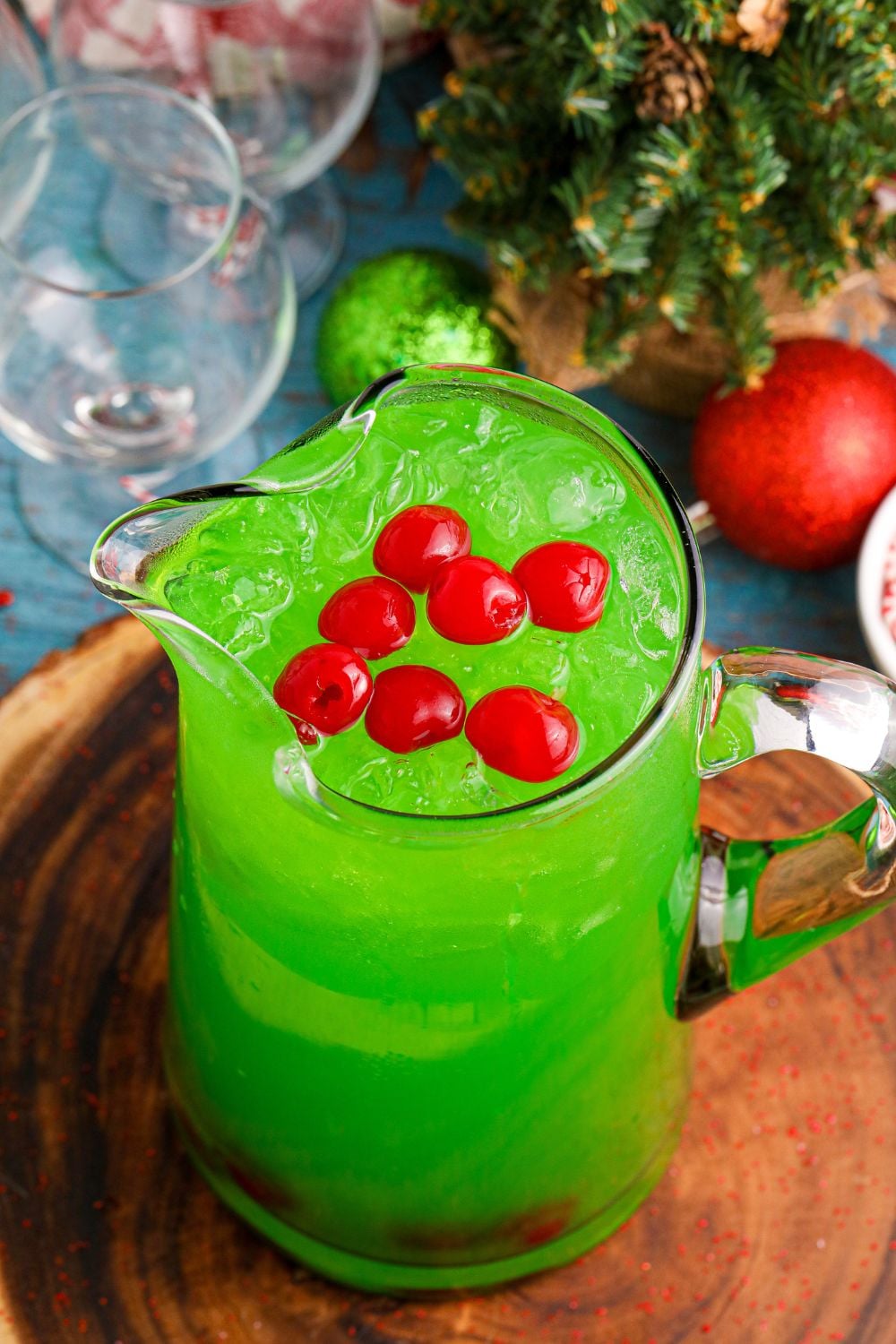 overhead shot of punch in a bowl on wooden cutting board