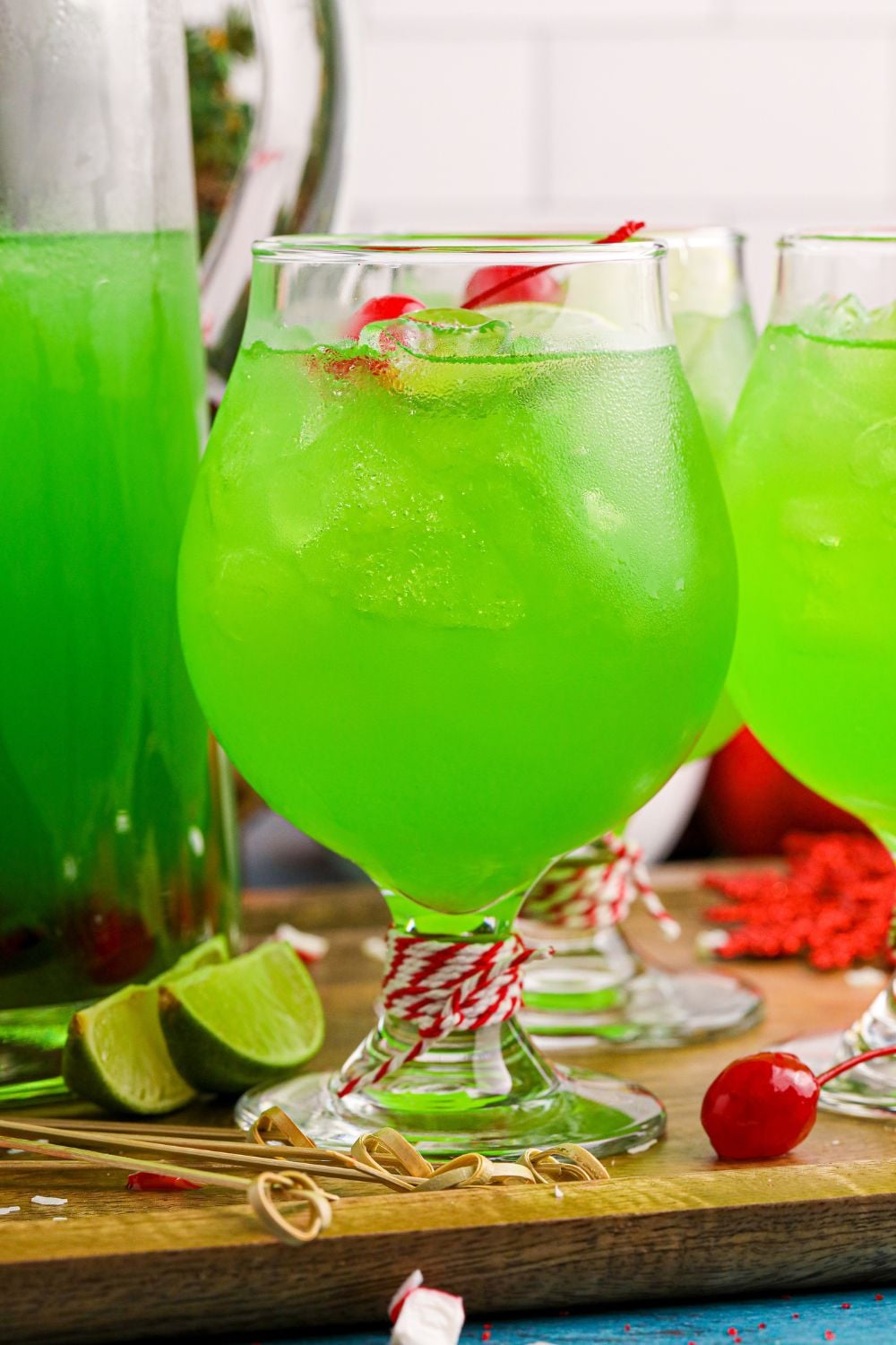 punch in glasses and a pitcher with extra punch in it