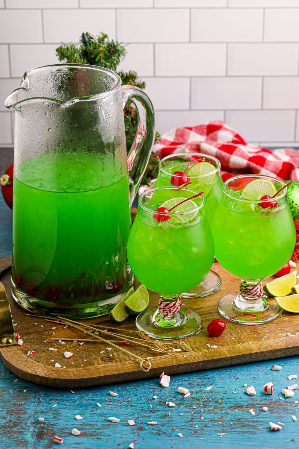 Grinch Punch on table in glasses and a pitcher