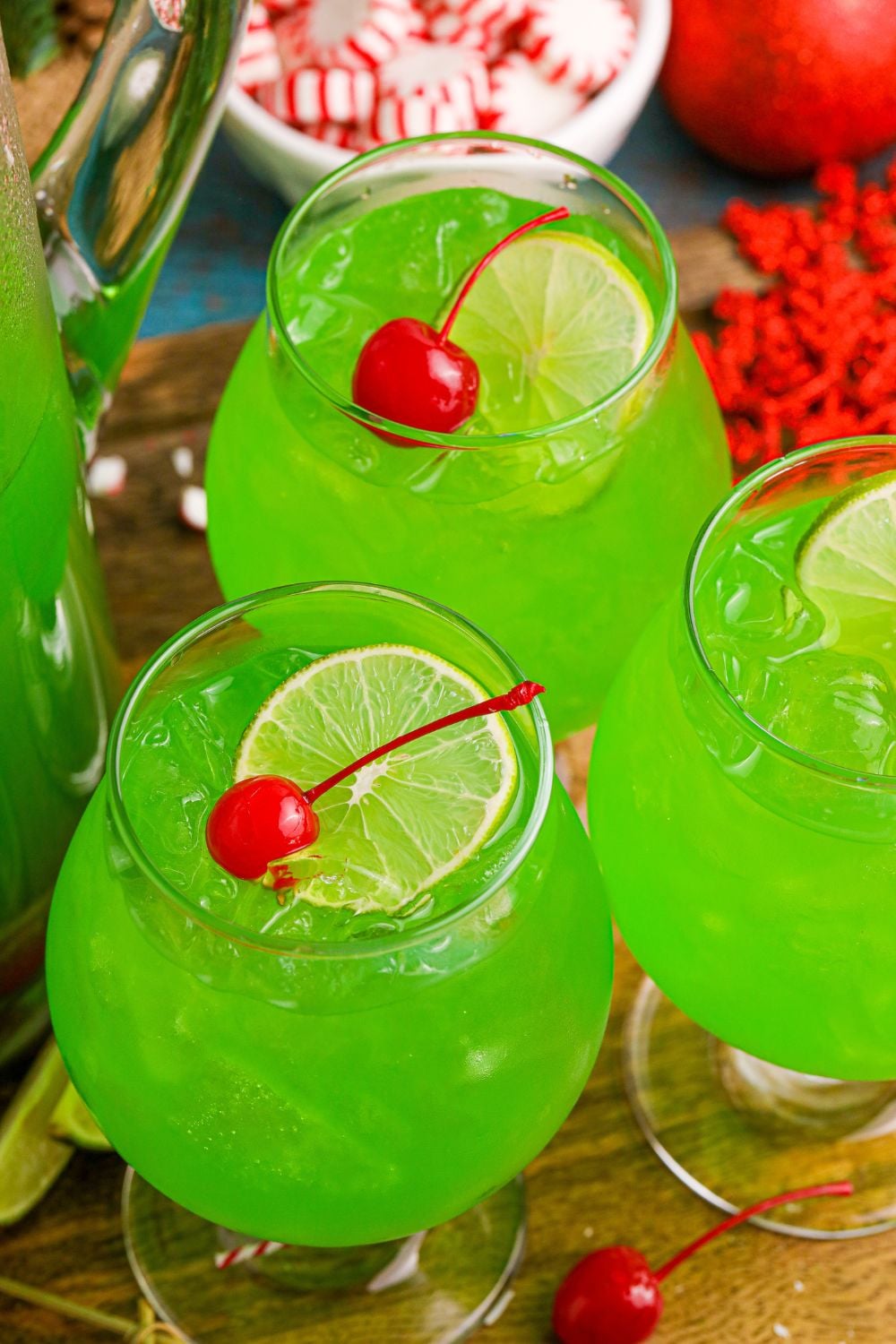 glasses on table full of a green punch