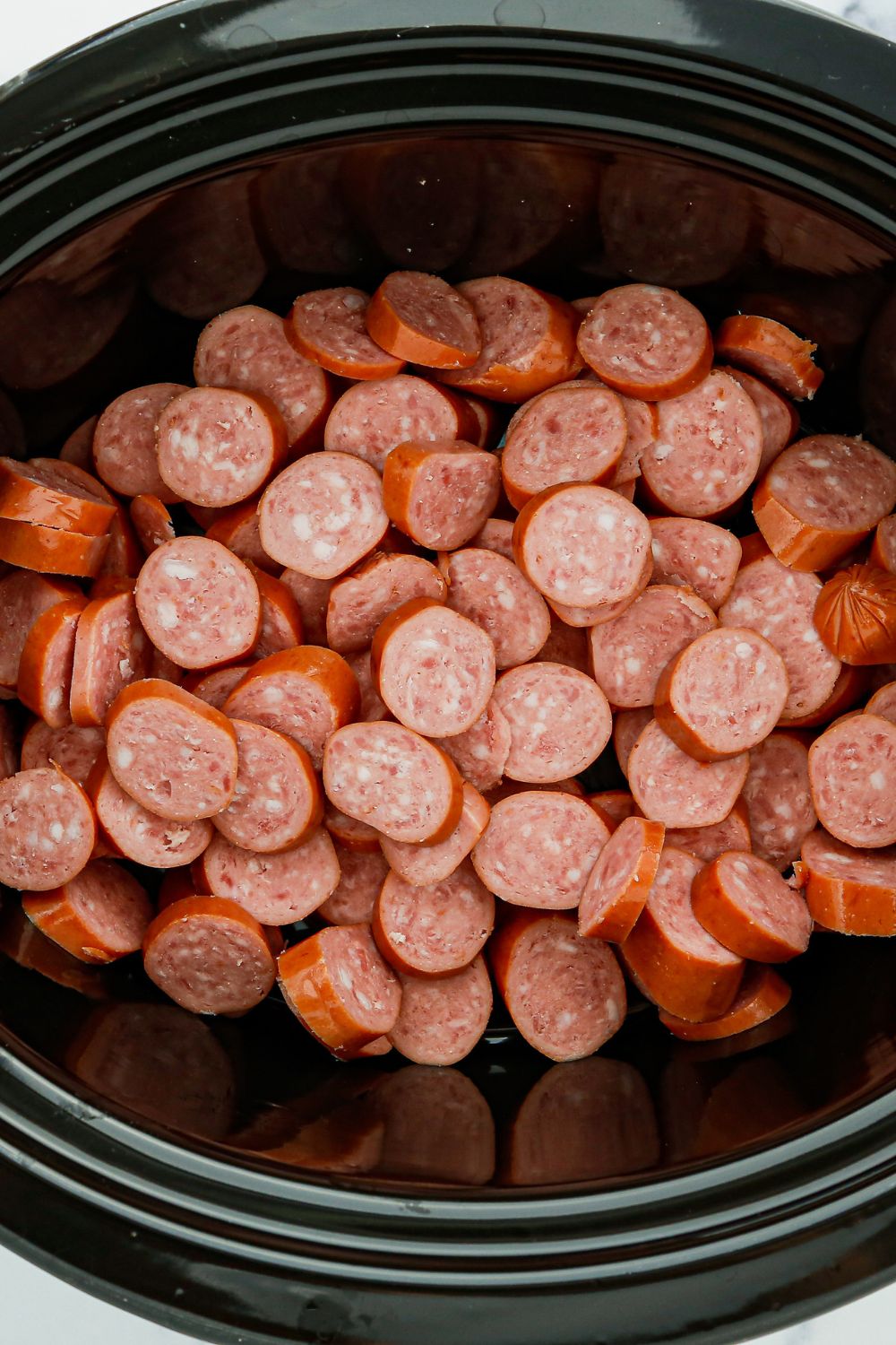 sliced smoked sausage in a crockpot