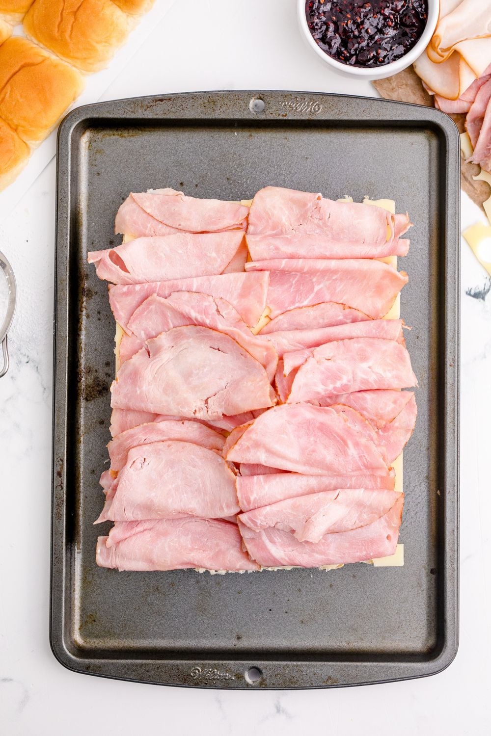 ham stacked on top of bread