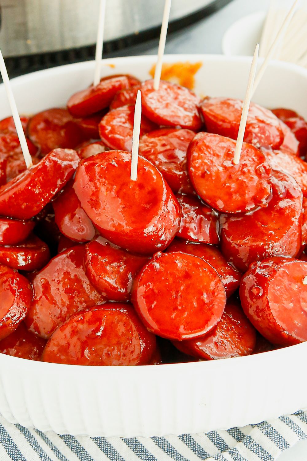 Kielbasa Bites with toothpicks in them in bowl