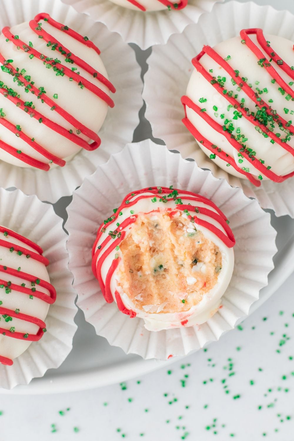 snack cakes in a container with a mini cupcake liner on them