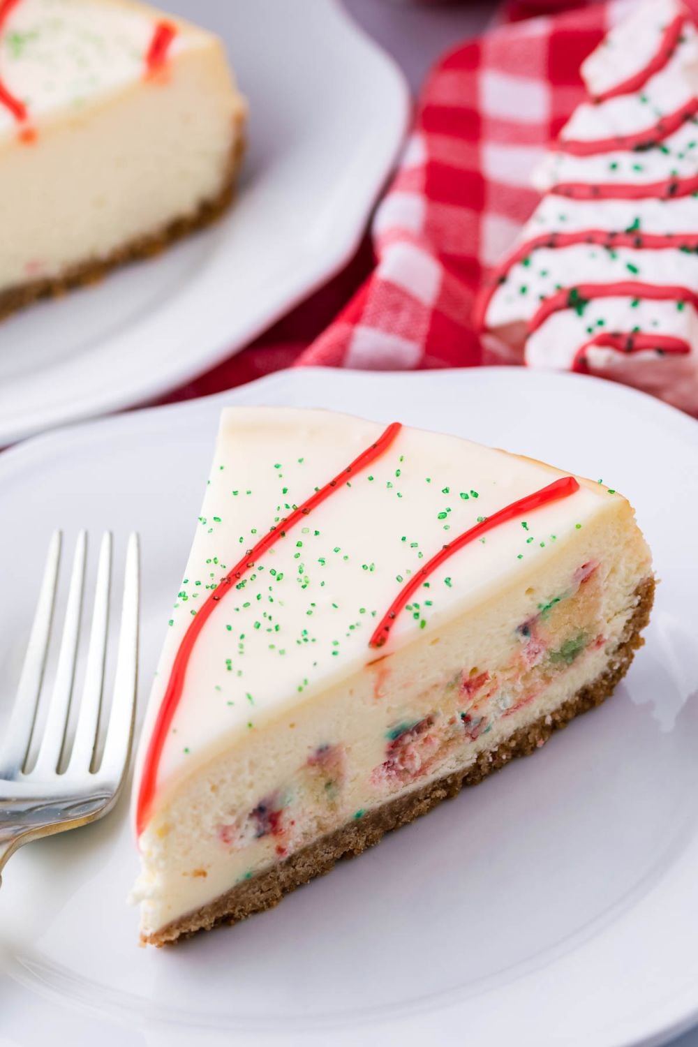 slice of a little debbie cheesecake on plate with fork by it