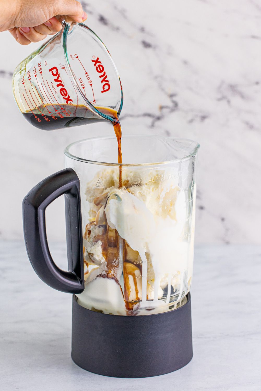 chocolate liquor pouring into blender