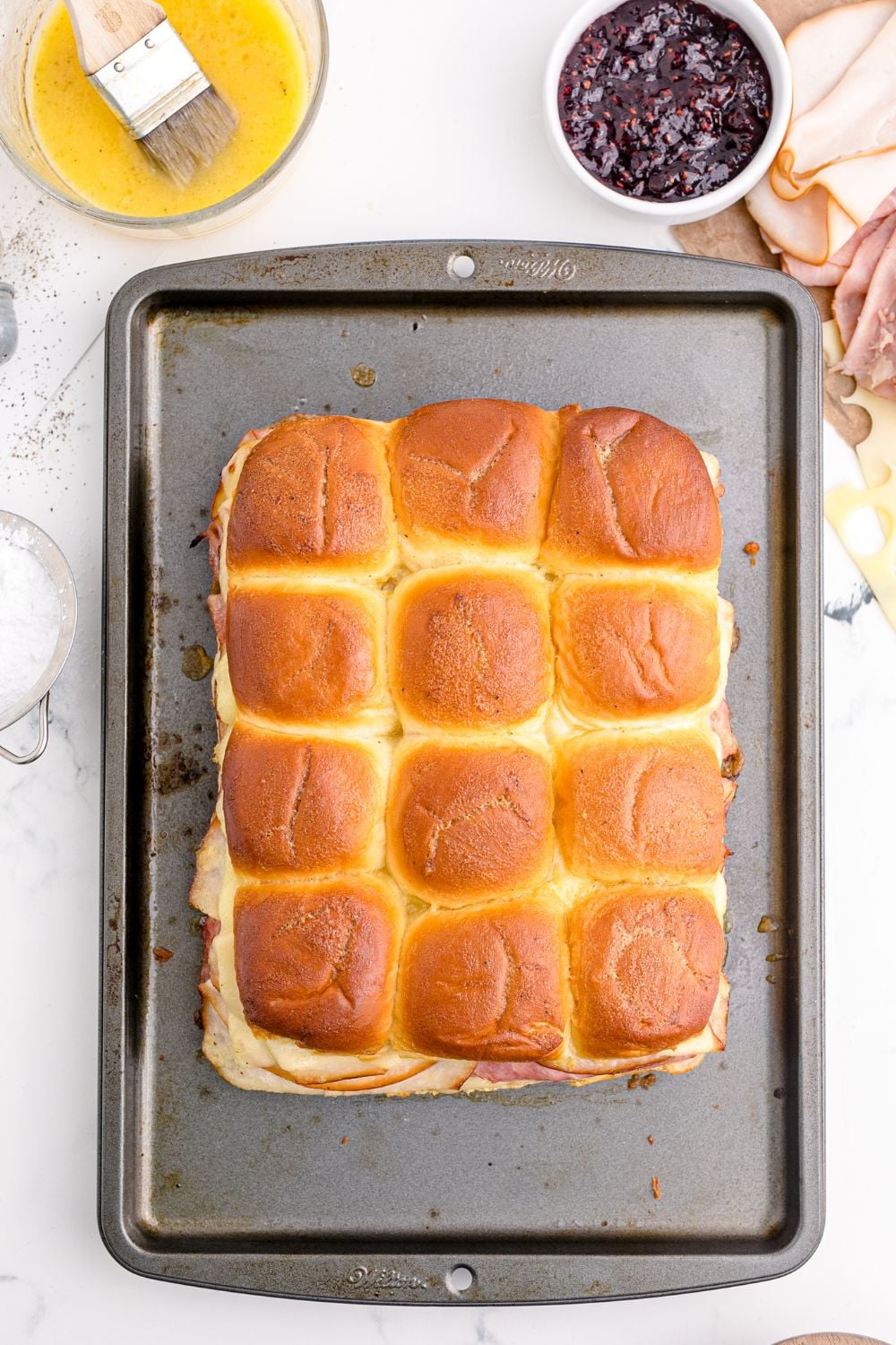 baked sliders on baking tray