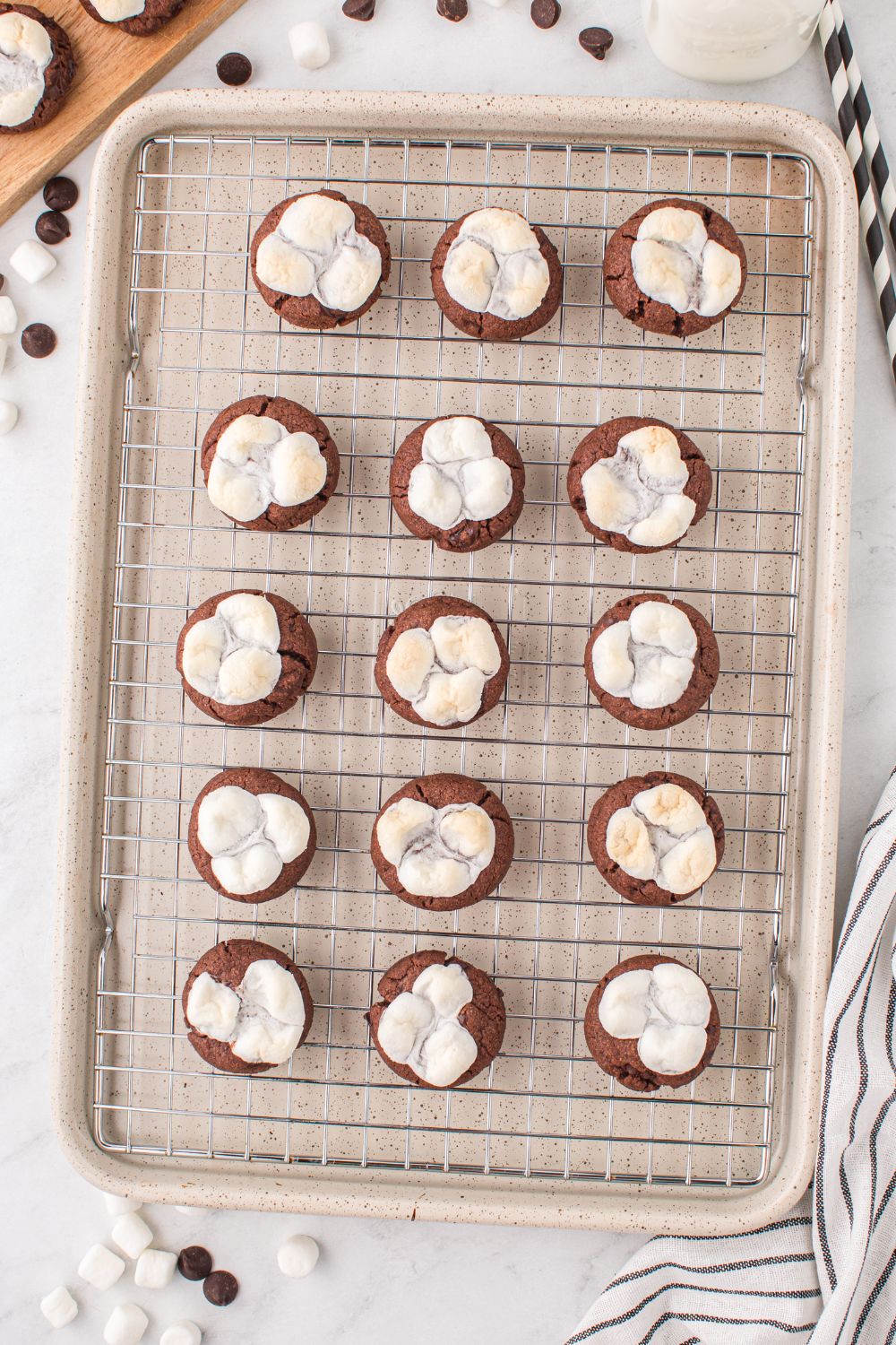 overhead view of hot chocolate cookies with marshmallows on top