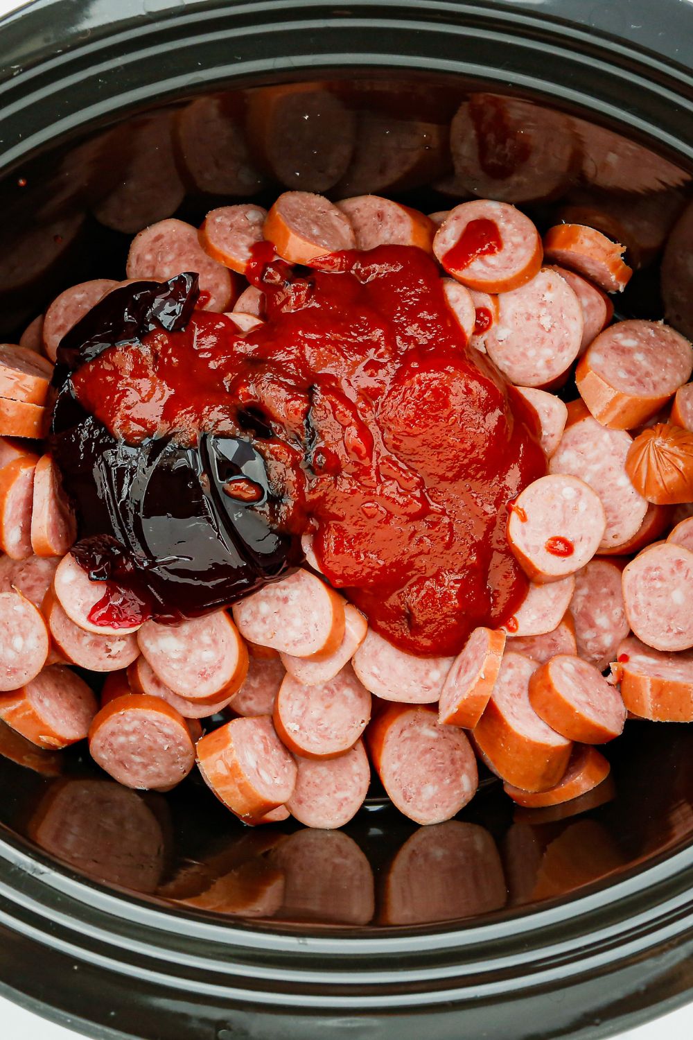 ingredients for kielbasa with sauce on top
