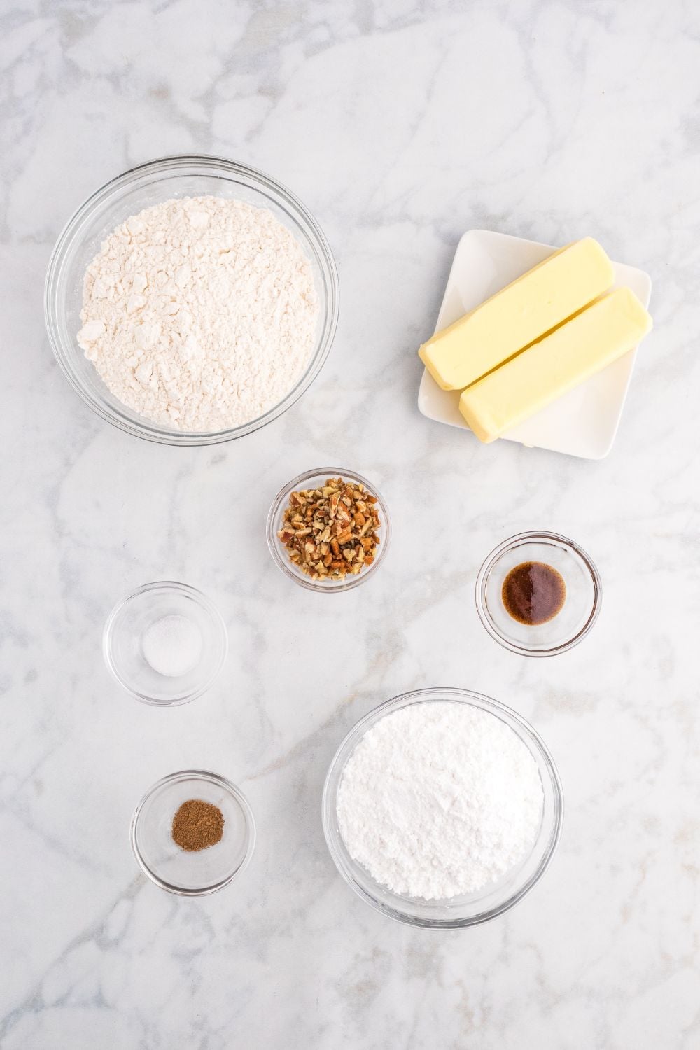 cookie ingredients on table in bowls and containers