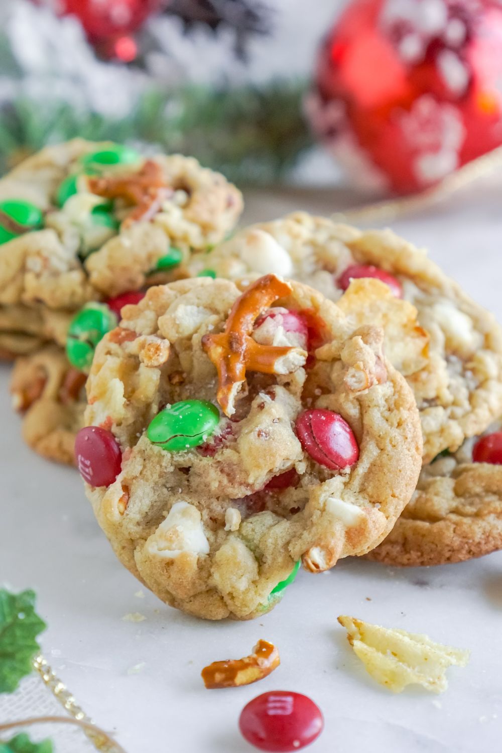 cookies with mix in ingredients around the cookies on the table