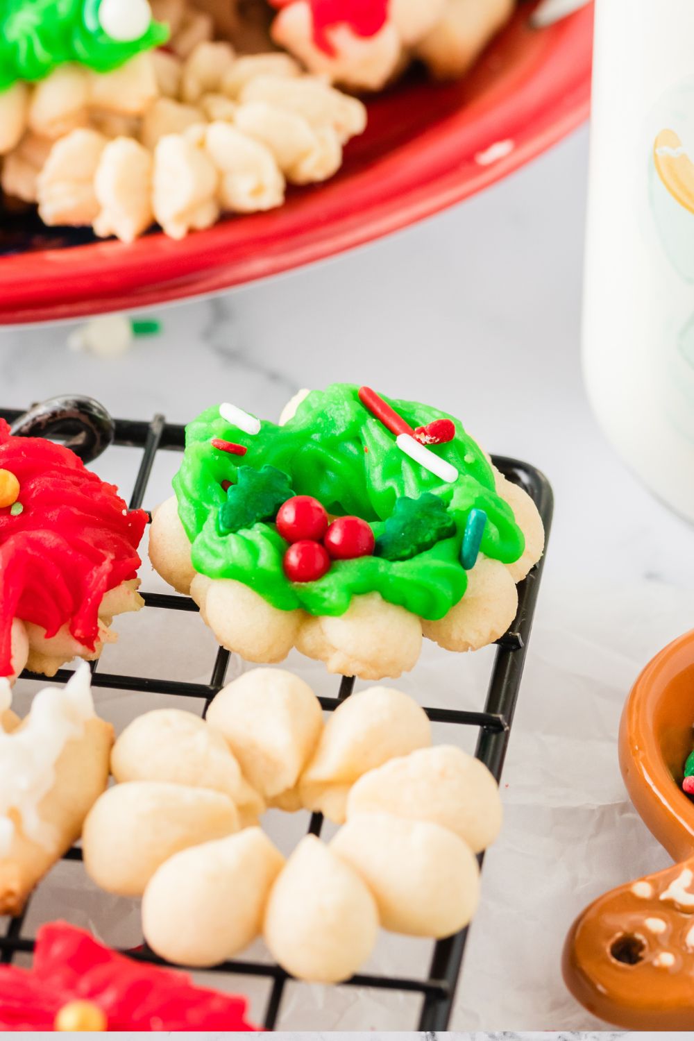 Christmas Spritz Cookies on a cookie tray on table