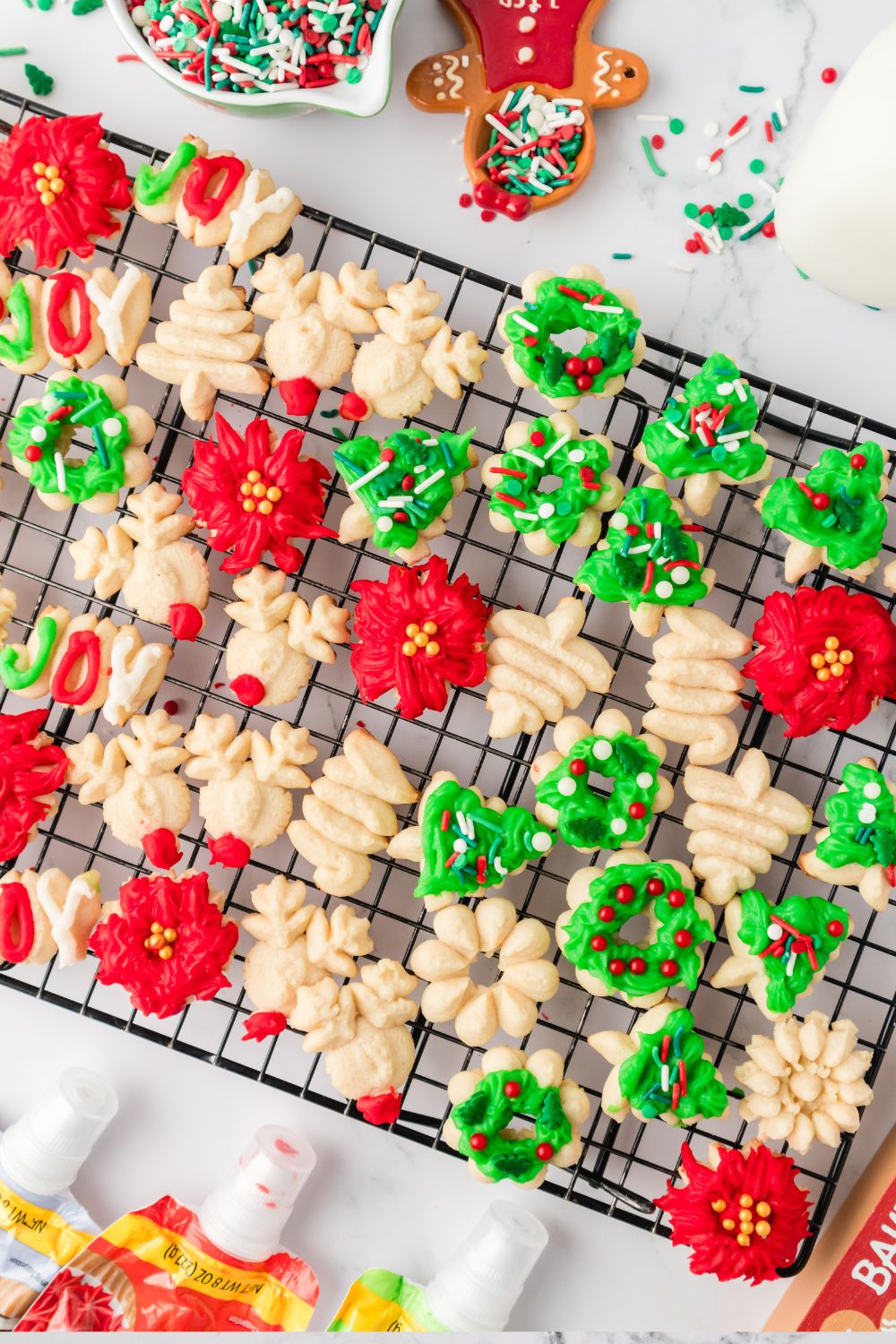 spritz cookies on baking rack on table