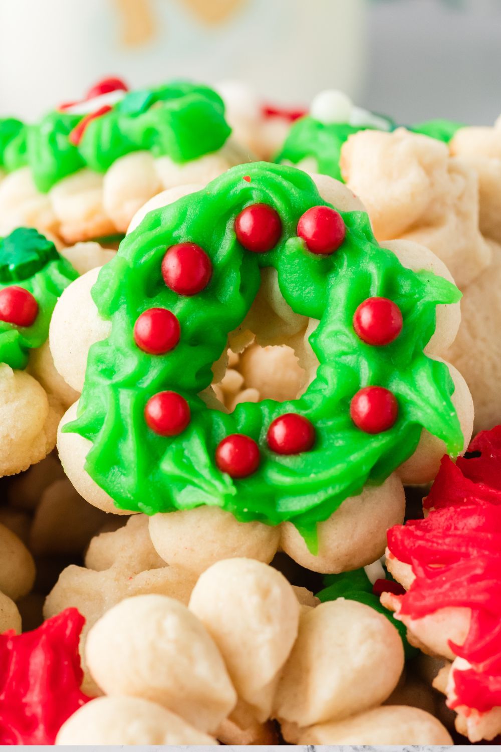 Spritzer cookies shaped and placed on table