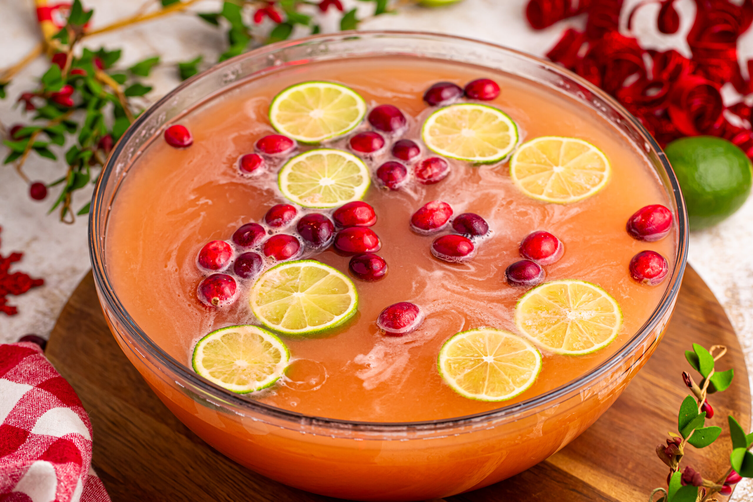 Santas giggle juice in a large punch bowl on a wooden table