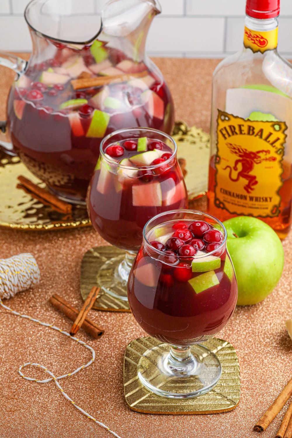 alcohol with cinnamon whiskey and wine in glasses