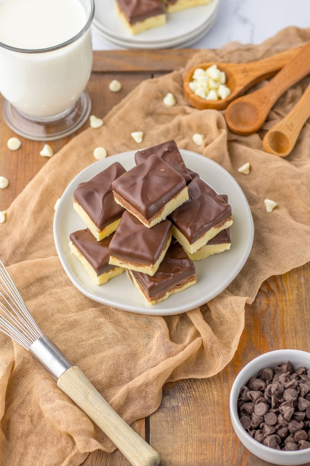 fudge on table with chocolate chips and items around it