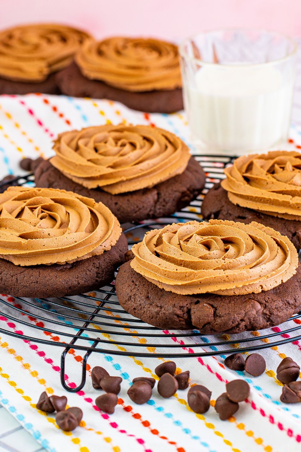 Chocolate Cake Cookies on a round tray with chocolate chips set in front 