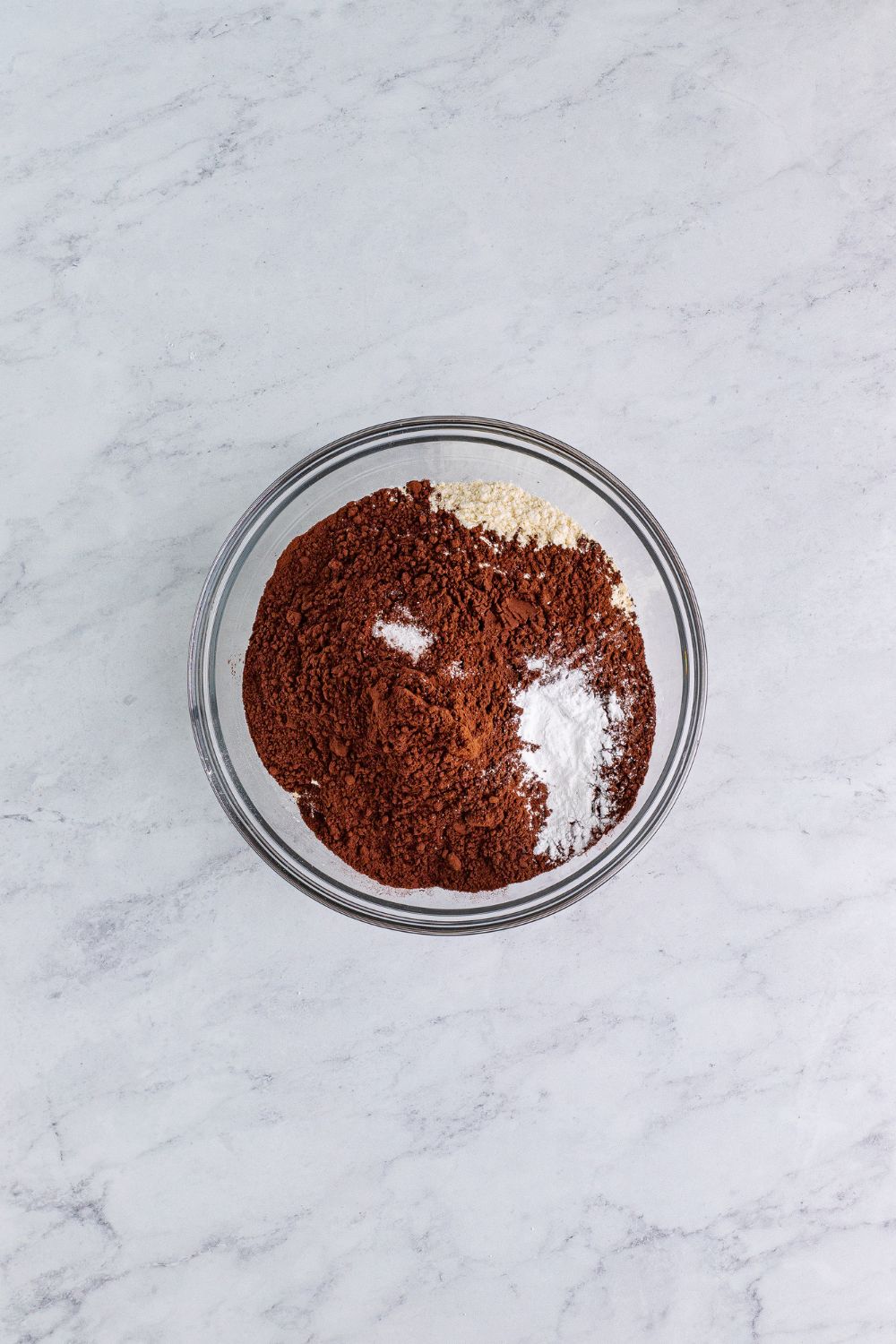 dry ingredients in a glass bowl for the Chocolate Cake Cookies