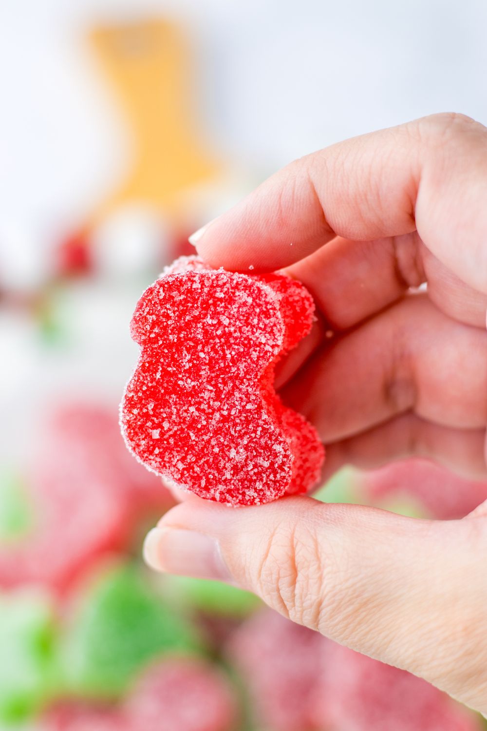 holdiing a christmas gumdrop 