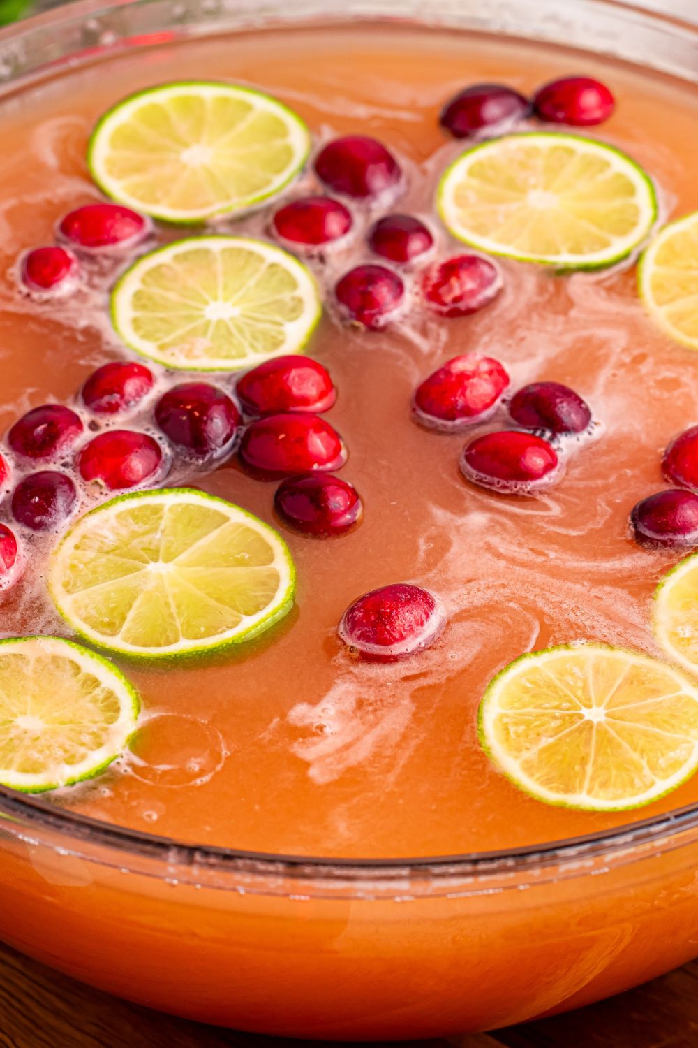 Santa's Giggle Juice Punch in a punch bowl with fruit on top