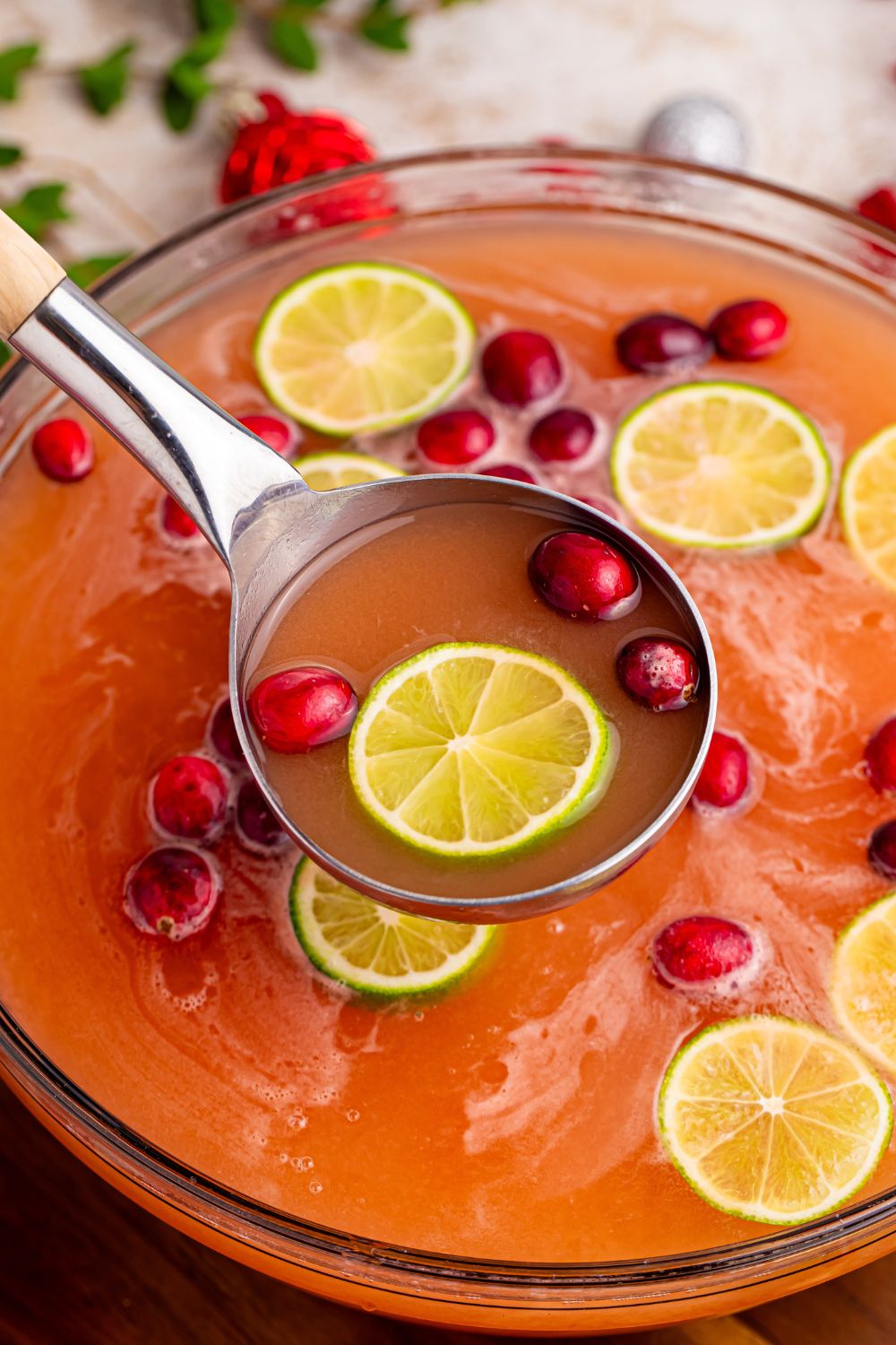 punch with a ladle and fruit on top