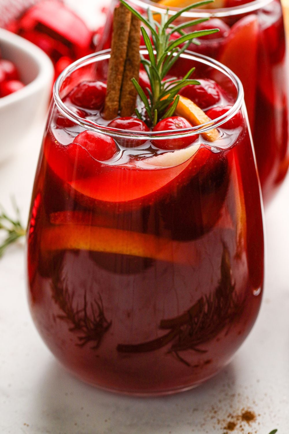side view of sangria in a glass on table