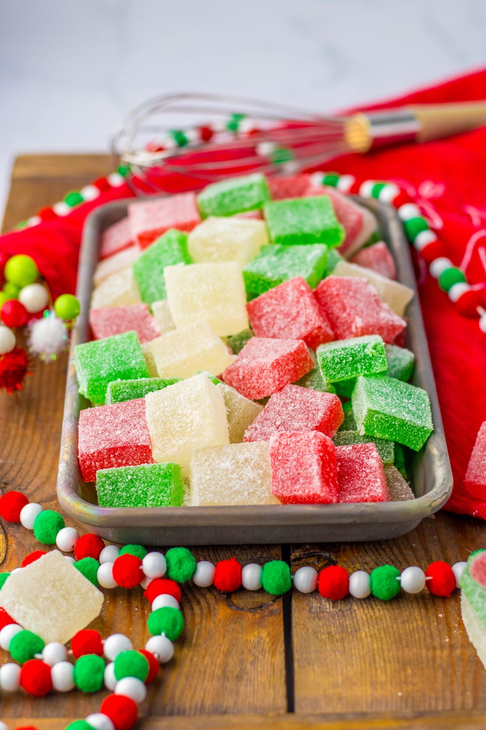 spiced drops on table with garland and a towel under the pan 