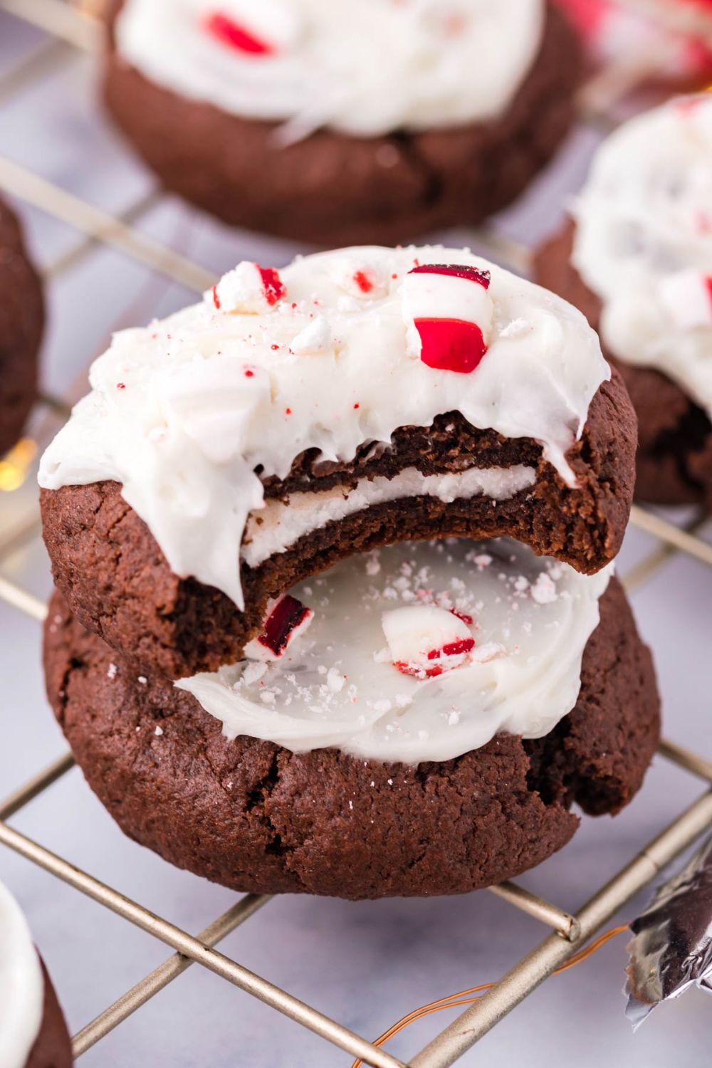 stacked cookies with a bite taken out 