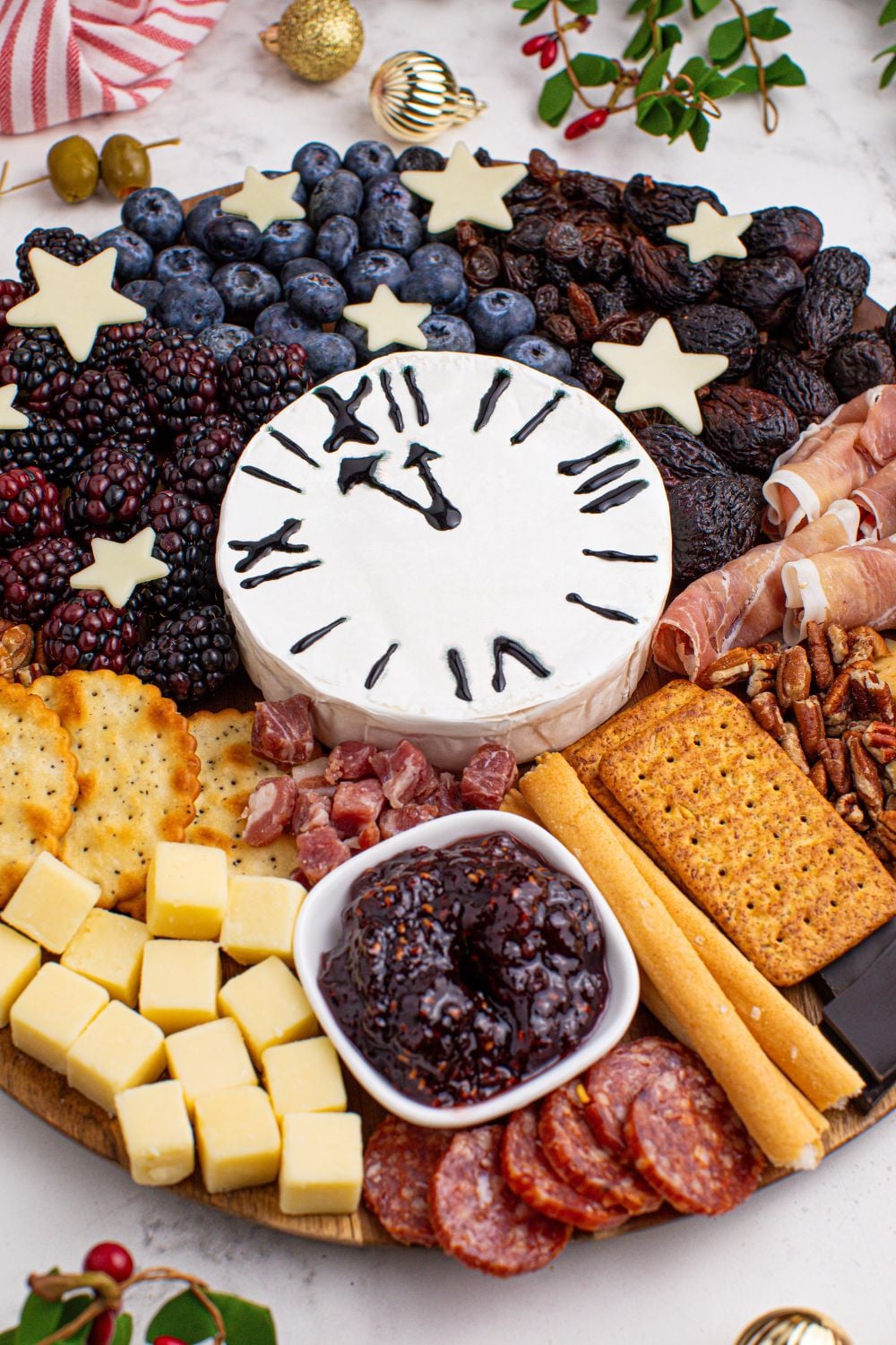 overhead side view of the New Year's Eve Charcuterie Board on a marble counter