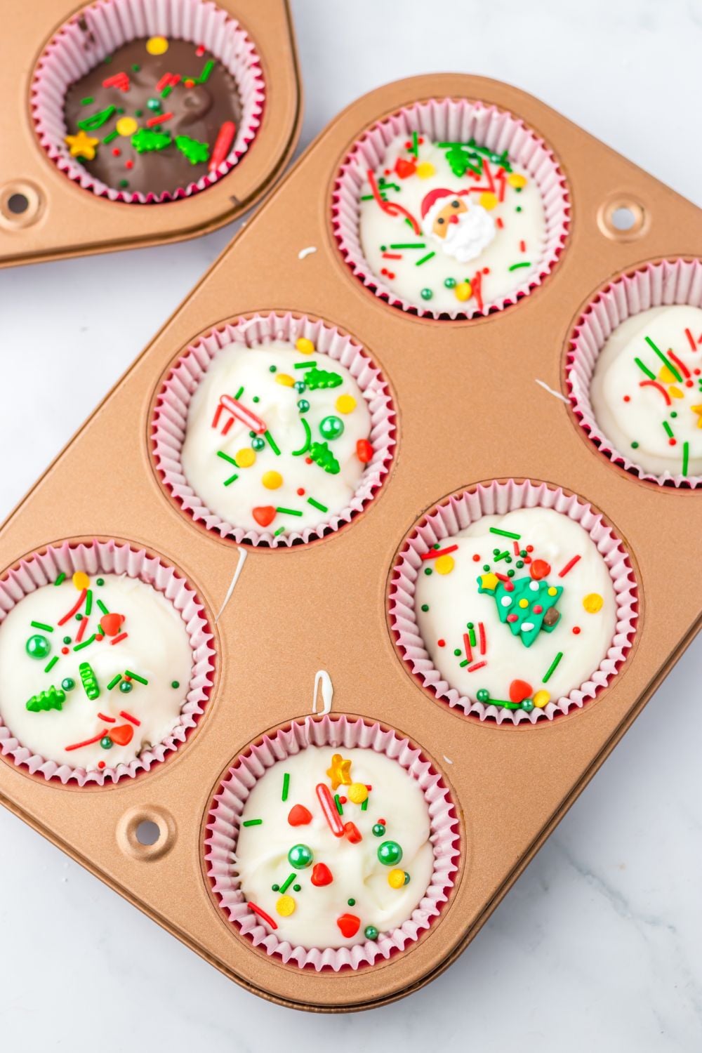 Christmas Peanut Butter Cups in a muffin tin