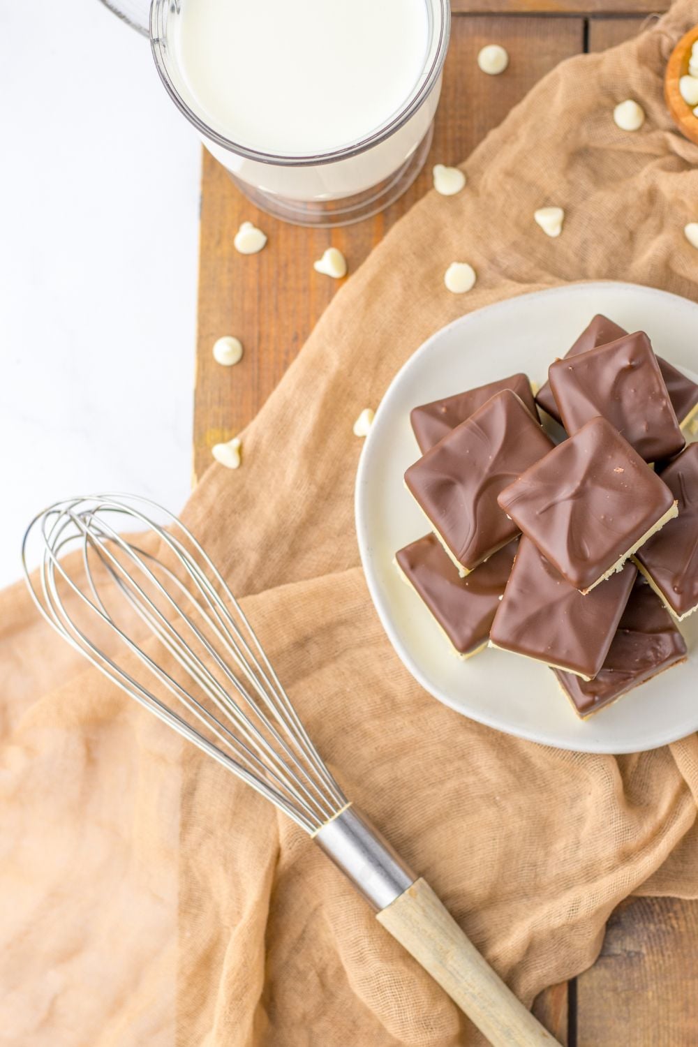 fudge on plate with whisk to the side