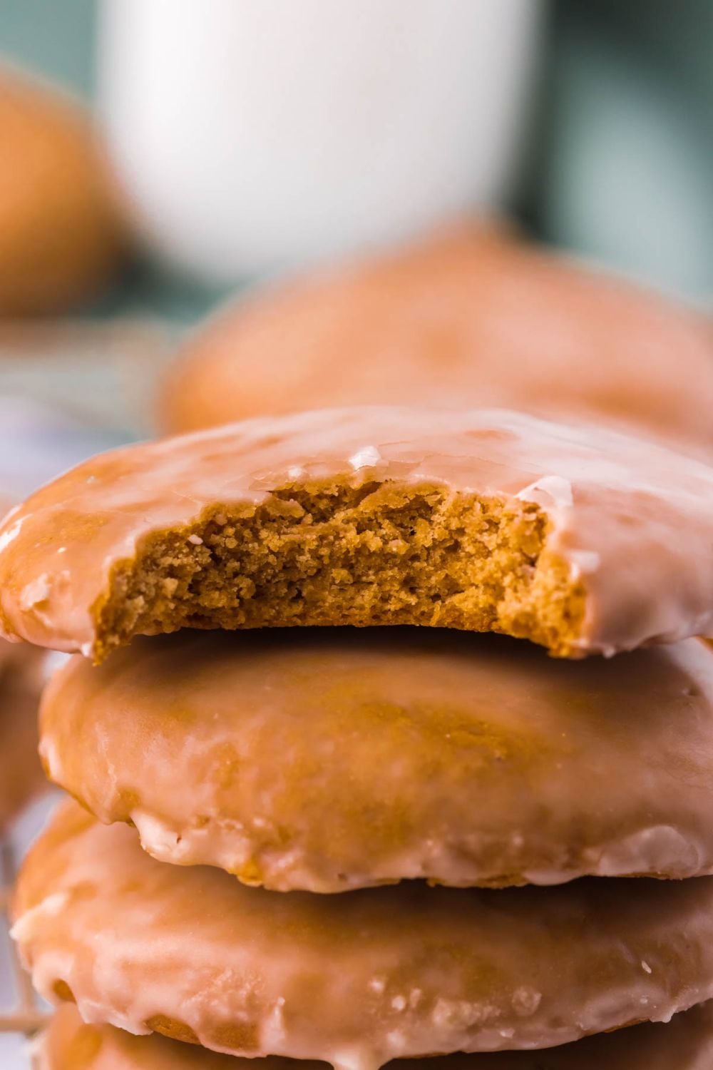 cookies stacked on top with one that has a bite out of it