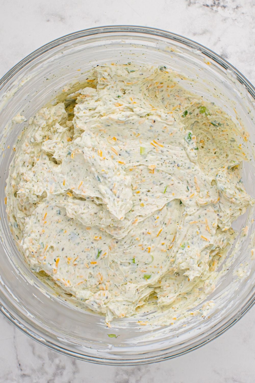 cheese ball mixture in a bowl on table