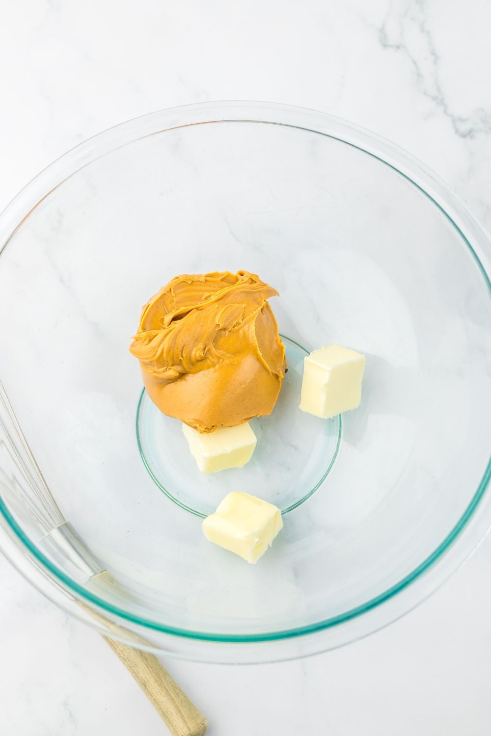 peanut butter and butter in a glass bowl
