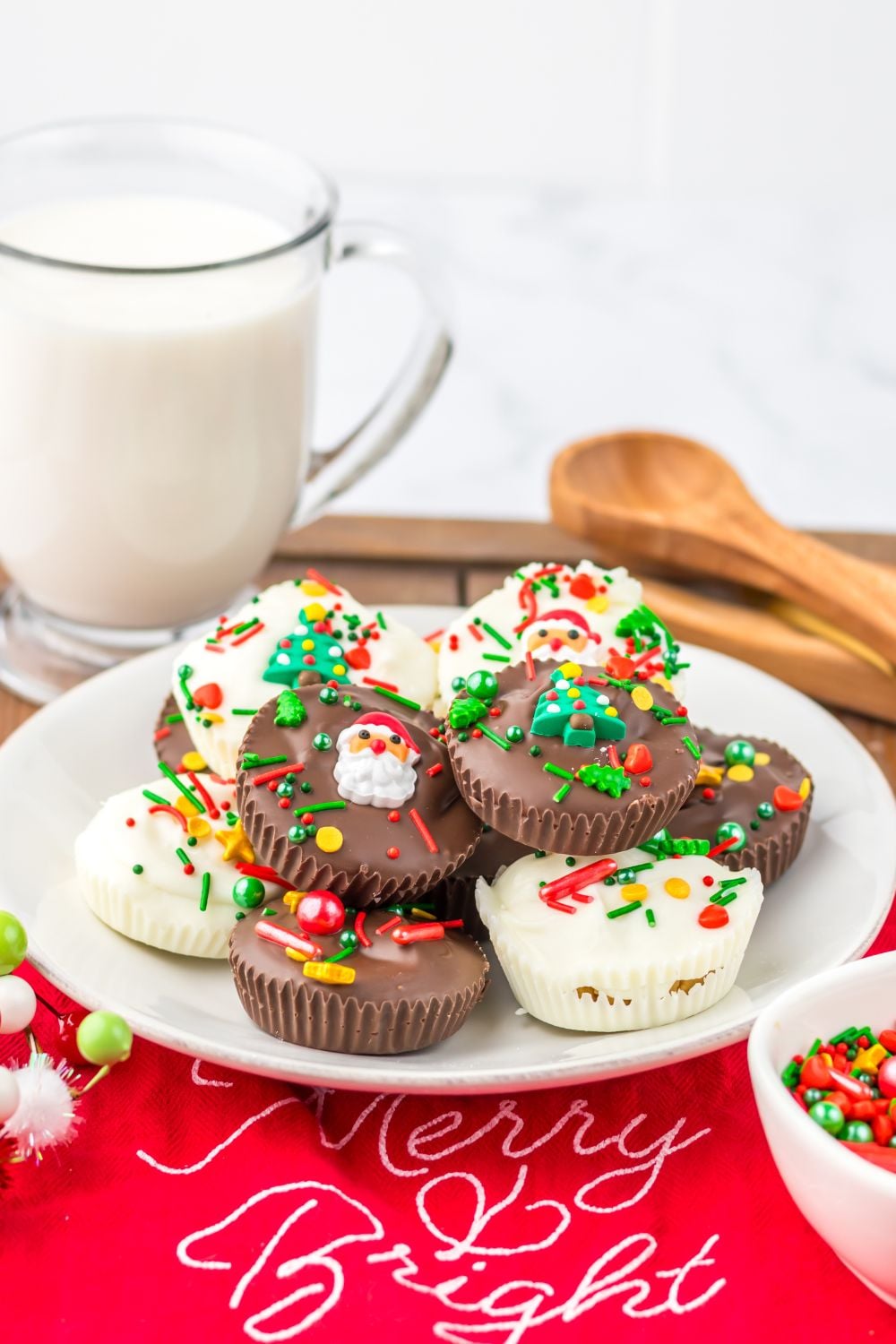 Christmas Peanut Butter Cups on table with milk and such on table